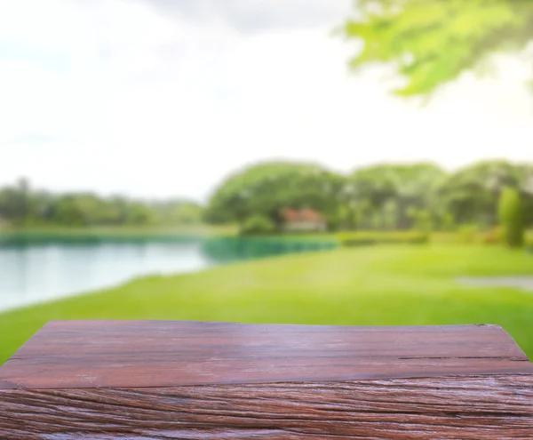 Tabla superior y desenfoque naturaleza de fondo — Foto de Stock