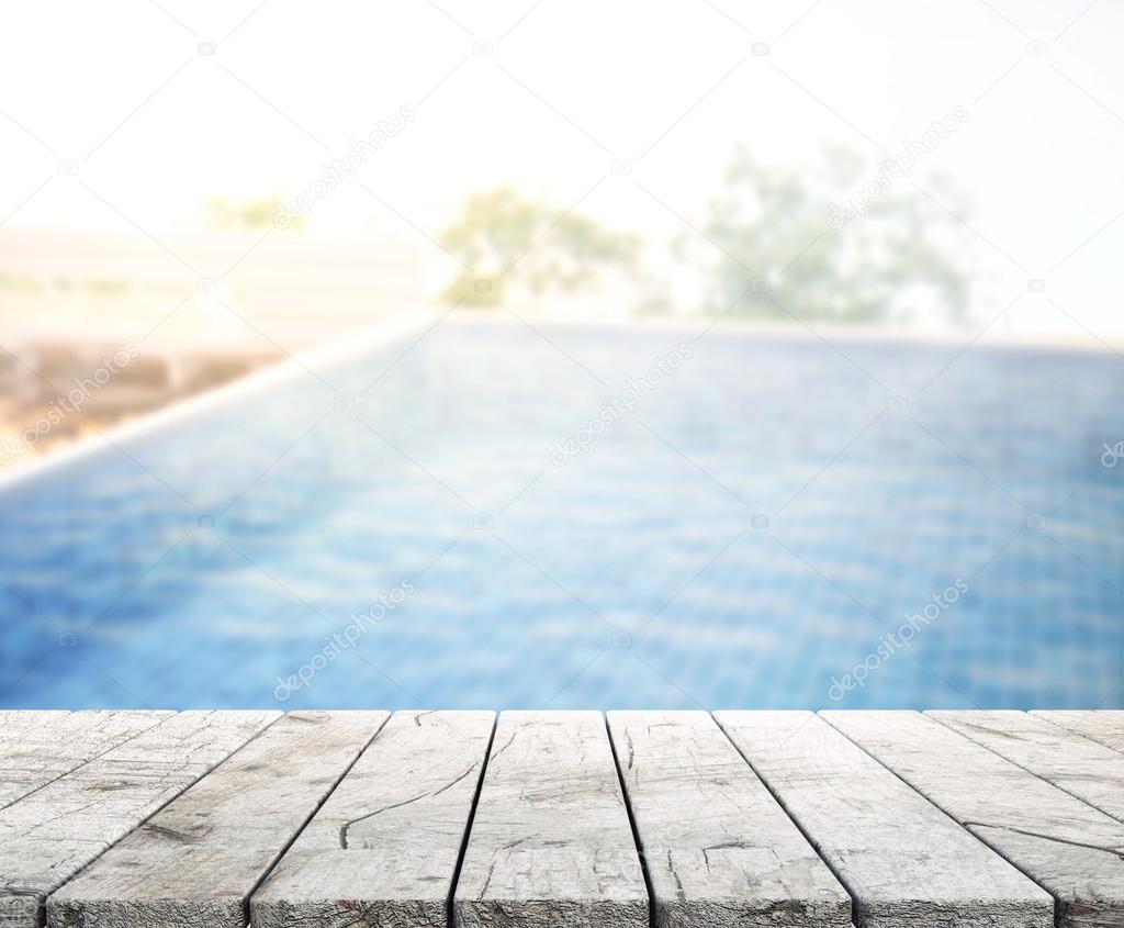 Wood Table Top of Background and Pool