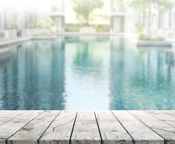 Wood Table Top of Background and Pool — Stock Photo, Image