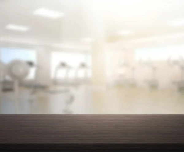 Table Top And Blur Fitness Gym of Background — Stock Photo, Image