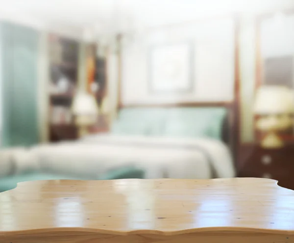 Piano d'appoggio e sfondo sfocato in camera da letto — Foto Stock