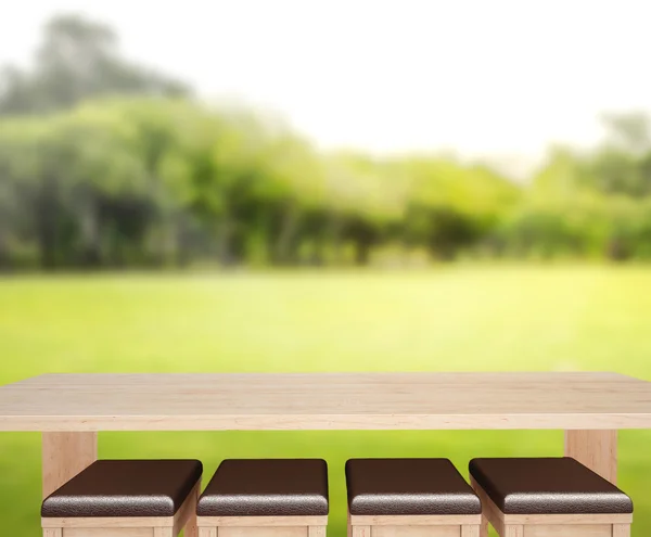 Tampo da mesa e desfoque natureza do fundo — Fotografia de Stock