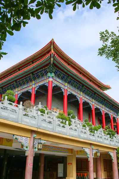 Red poles of Chinese pavilion in Trees framed — Stock Photo, Image