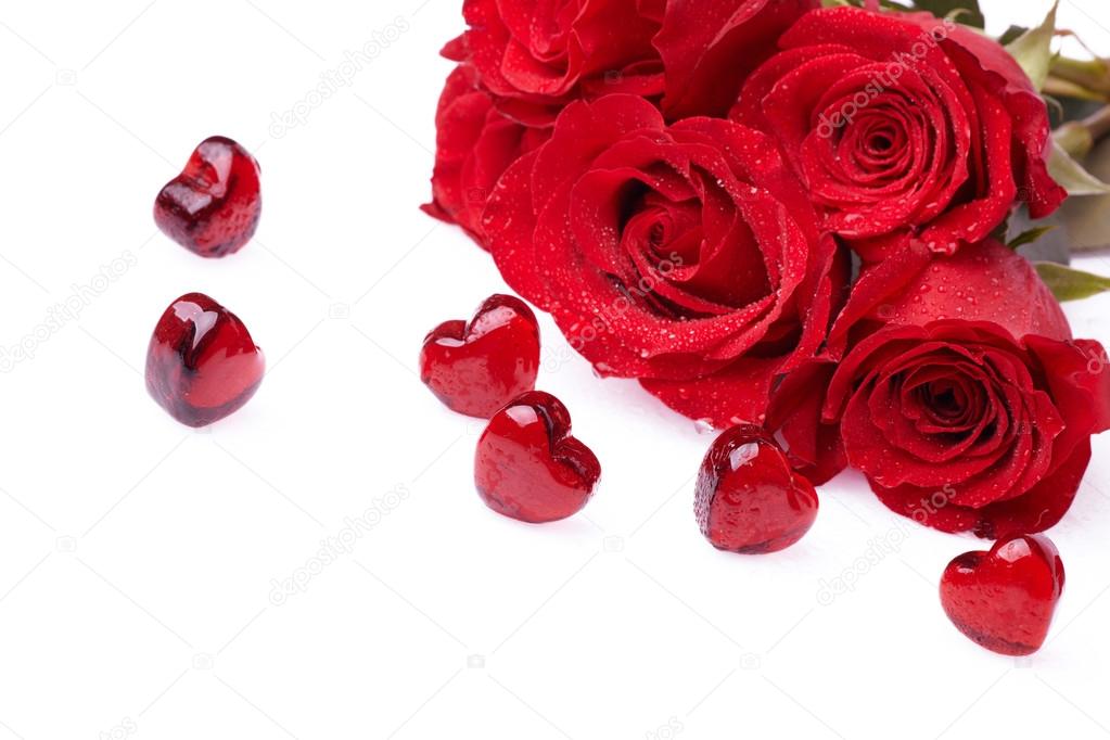 Rose and hearts in water drops