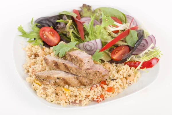 Gegrilltes Schweinefleisch und Couscous — Stockfoto