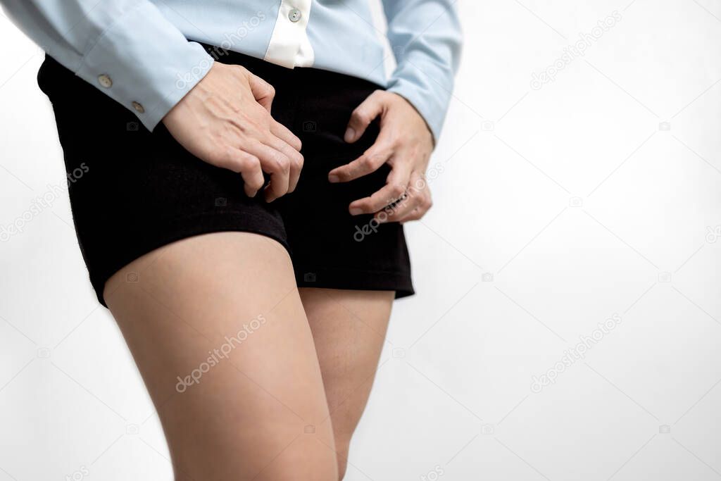 Female people scratching crotch with leucorrhoea,vaginitis,burning itchy genital,vaginal itching and unpleasant smell,problems of bacterial vaginosis,leukorrhea,gynecological and health care concept