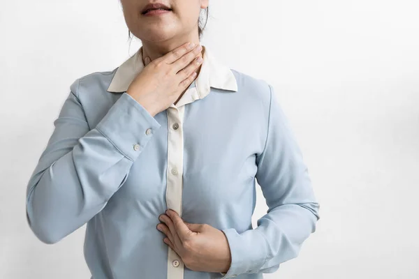 Asian female patient with gastroesophageal disorders,acid reflux disease,gastritis,indigestion,heartburn,burning sensation in the chest epigastric area,regurgitation of stomach acid,health problems