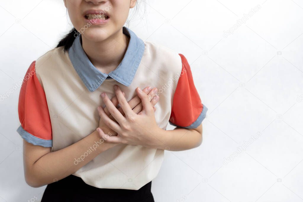 Sick asian child girl having difficulty breathing,patient suffering from pain in chest feel tight,acute dyspnea,asthma,shortness of breath,problems of heart attack,chronic health congenital disease