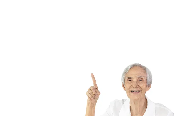 Щаслива Усміхнена Азіатська Старша Жінка Вказує Пальцем Порожній Простір Копіювання — стокове фото