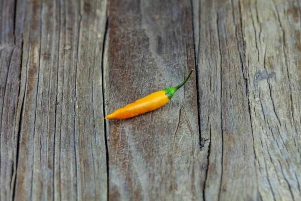 Assorted fresh and fiery hot chili peppers