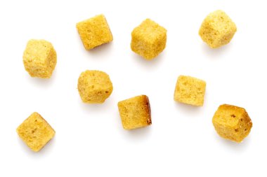 Cluster crispy croutons. Cubes of bread toasted and fried in oil. Isolated white background clipart