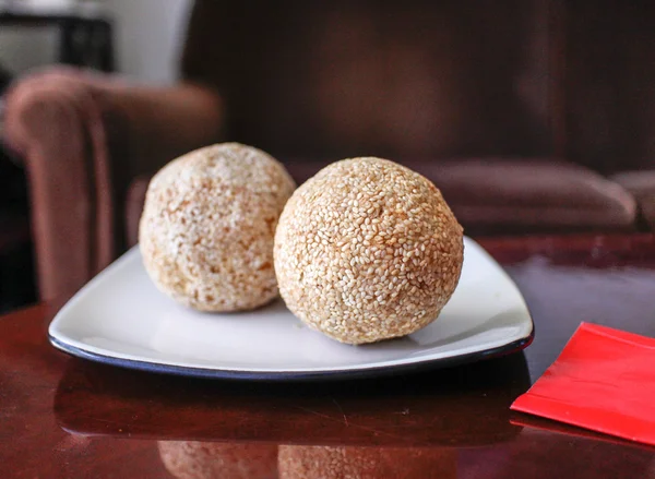 Chinese sesame balls on white plate — Stock Photo, Image