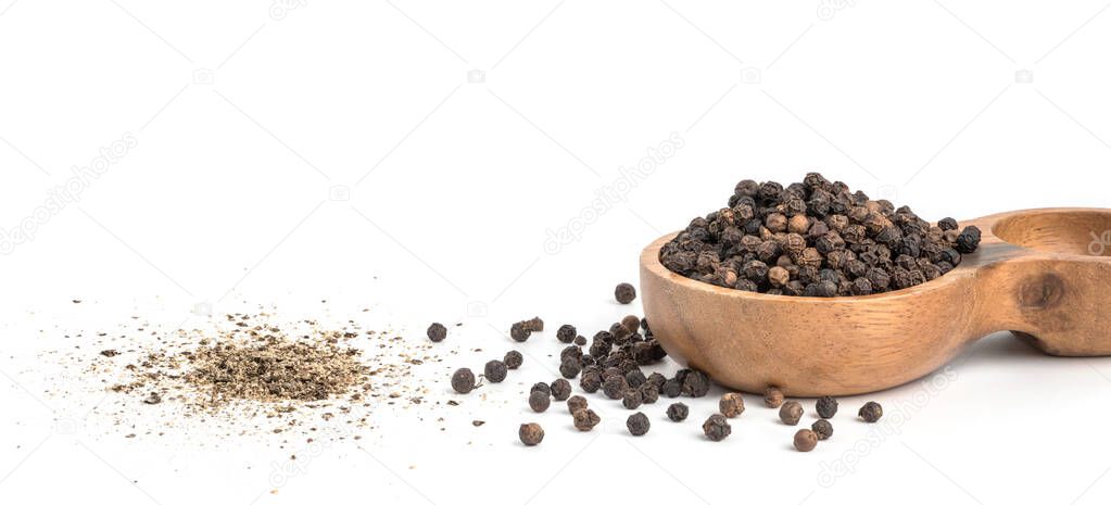 Black pepper seeds on white background. Food ingredients, spices