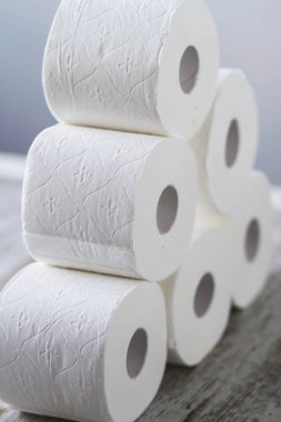Toilet paper rolls stacked at home