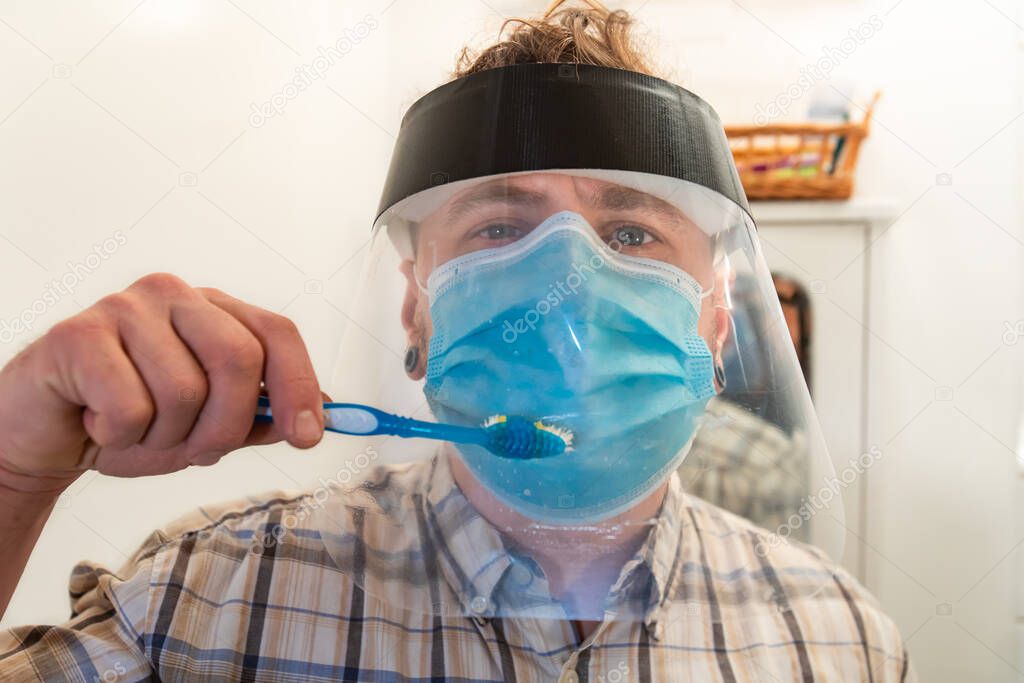 Living with coronavirus safety mask and visor