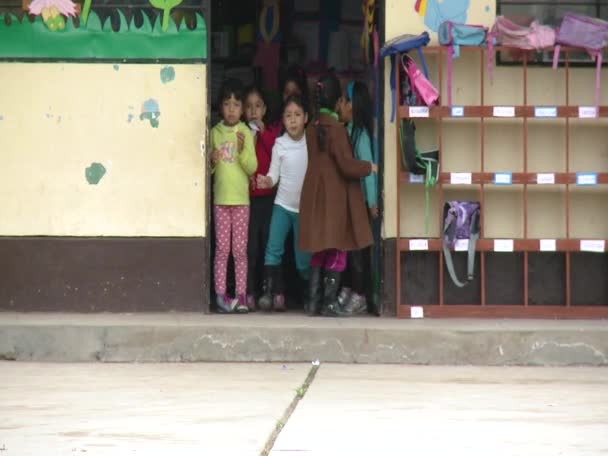 Cheerful school kids outside classroom — Stock Video