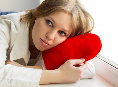 Beautiful girl is sad, sadness due the guy, keep heart clipart