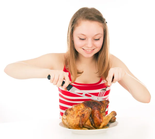 Ung flicka på en diet börjar att äta kyckling — Stockfoto