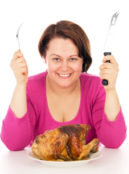 Volle Frau auf Diät, bereit, Hühnchen zu essen — Stockfoto
