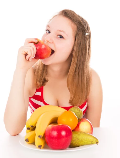 Krásná dívka a kousla do jablka — Stock fotografie