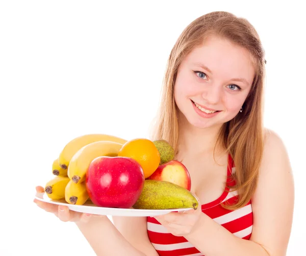 Menina segurando uma fruta — Fotografia de Stock