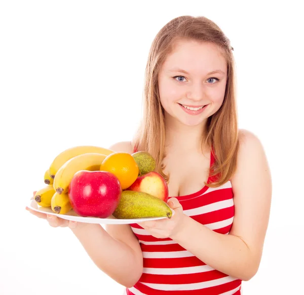 Girl holding a fruit Stock Image