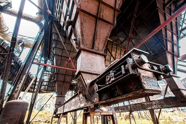 Old steel factory Retro photography Industrial, old factory, metal pipe, dark interior decoration of large hall for production or warehouse. Industrial plant Abandoned. Go out of business. soft focus.