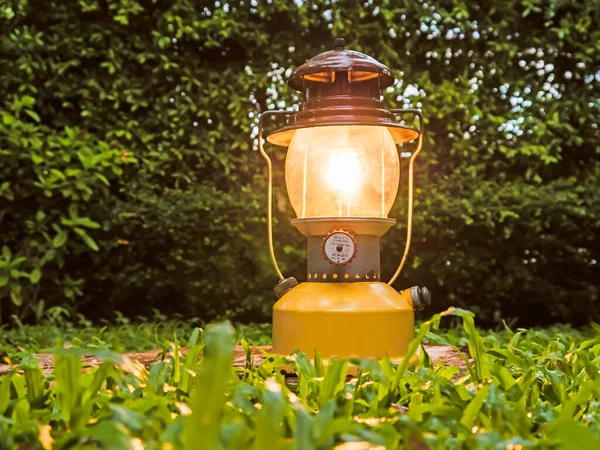 Antique Yellow Oil Lamp Green Lawn Soft Focus — Stock Photo, Image