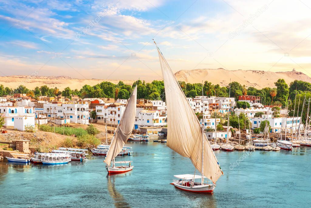 Traditional view of Aswan, the Nile and sailboats, Egypt.