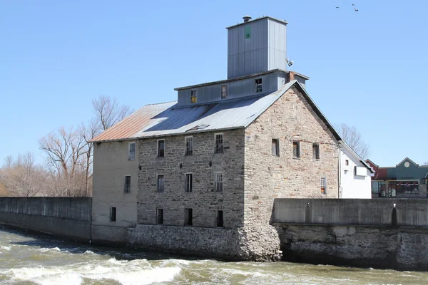 Old stone mill on the river — Stock Photo, Image