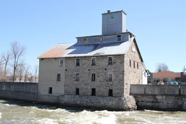 Old stone mill on the river — Stock Photo, Image