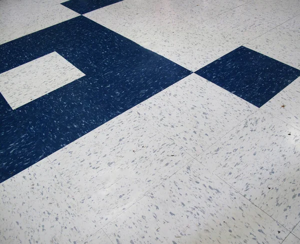 Modern blue pattern on white vinyl flooring