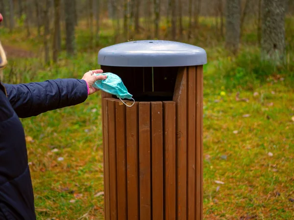 Selective Focus Woman Throws Used Face Masks Urn Virus Season — Stock Photo, Image