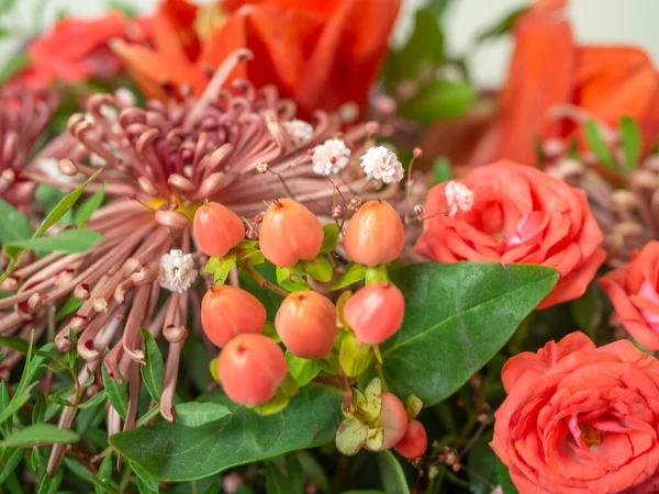 Fresh colorful variety flowers for sale at market. Flower arrangement of different colors. The photo is processed in vintage style.