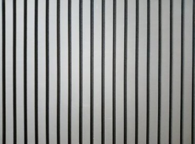 Çizgili siyah duvar arkaplanı. Dekoratif alçı panel dokusu. Duvar kağıdı.