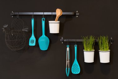 Kitchenware hanging in a wall clipart
