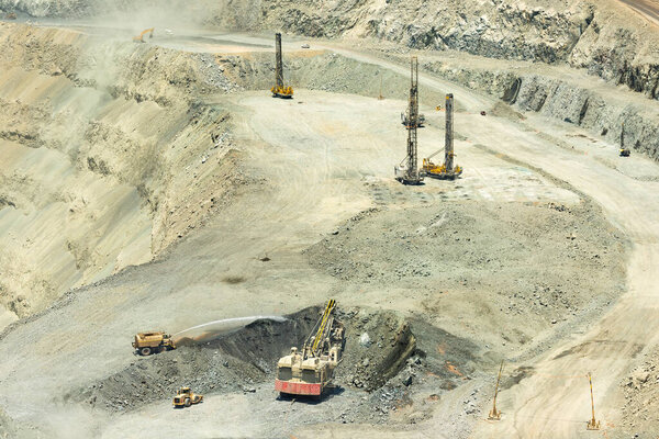 Electric rope shovel blasthole drills  at a copper mine in Chile