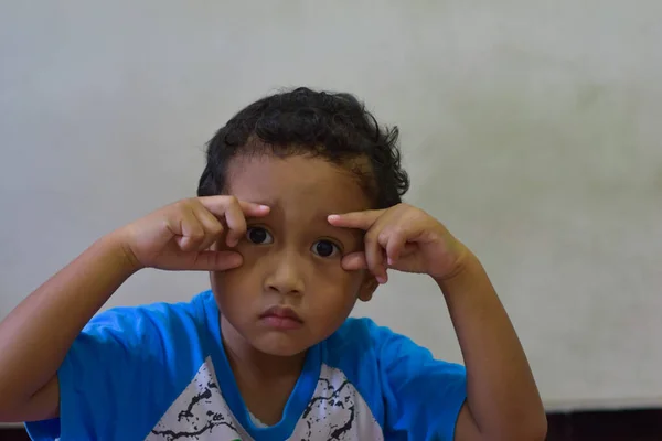 Boy Holding His Eyelids Wielding Eye Opening Expression His Hands — Stock Photo, Image