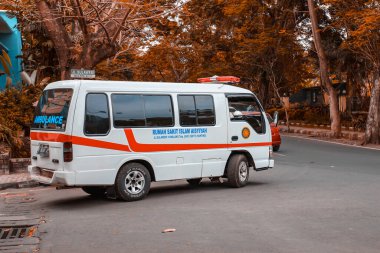 Malang, Indonesia -19 July, 2021: Rsi Aisyiyah Malang ambulance is on the road to provide services outside the hospital