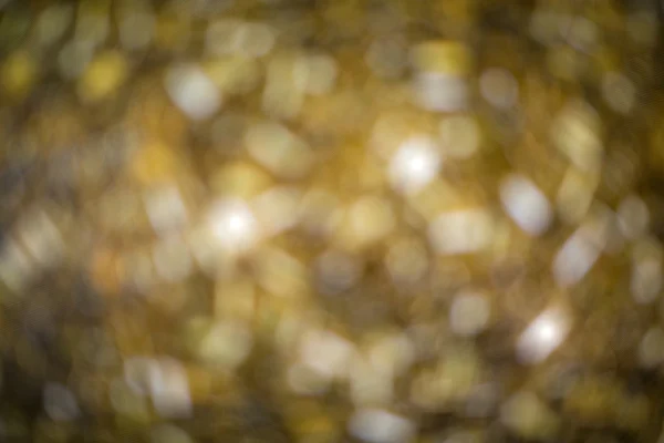 Gold colour bokeh abstract light background — Stock Photo, Image