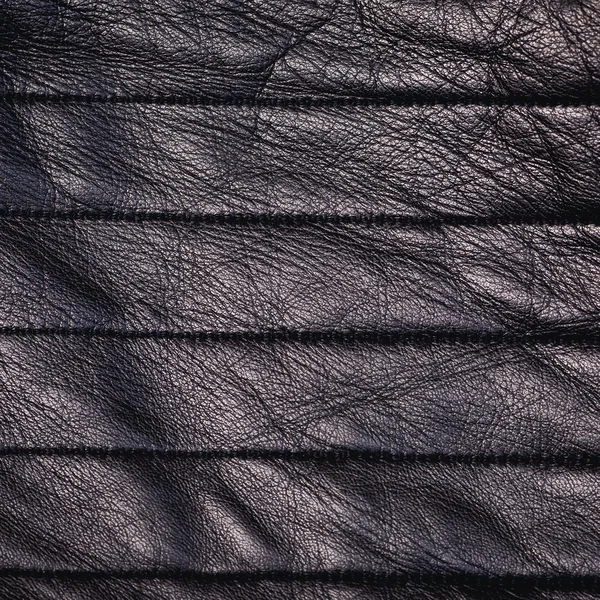 Closeup de textura de couro preto sem costura — Fotografia de Stock