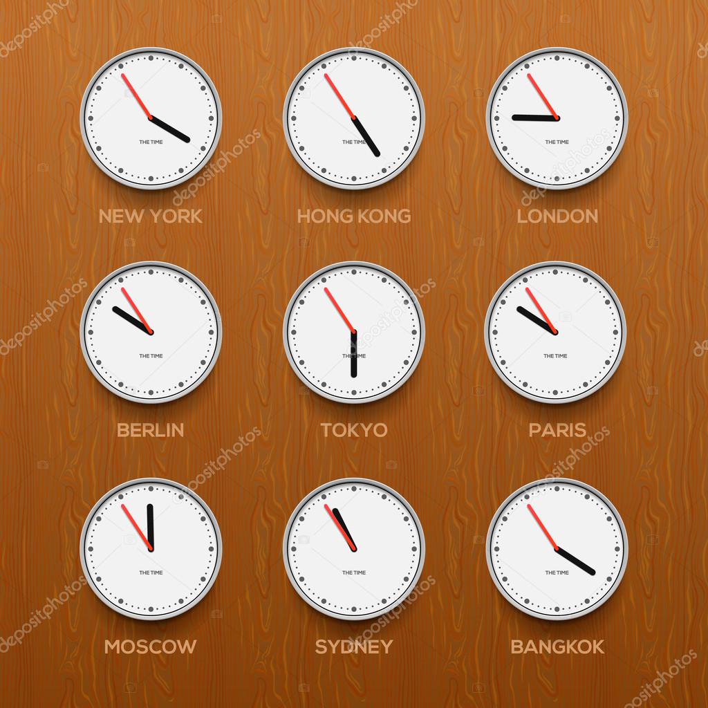 Timezone clocks showing different time, wooden wall background