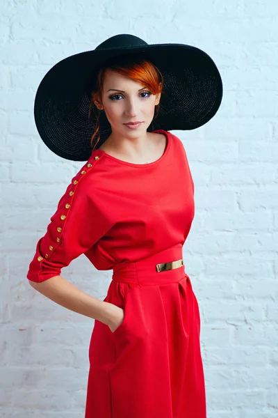 Woman posing in red dress — Stock Photo, Image