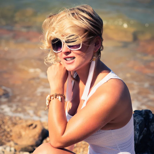 Young woman in a white bathing suit — Stock Photo, Image