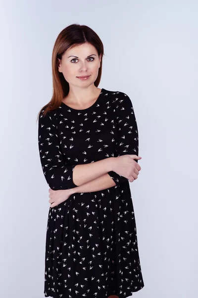 Portrait of young girl in black dress — Stock Photo, Image