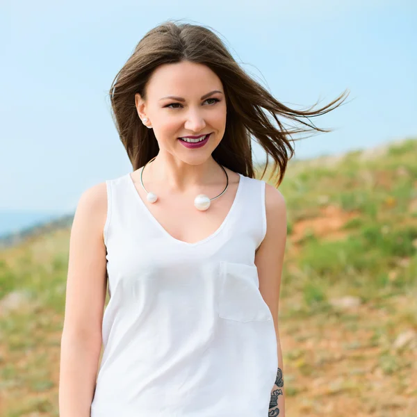 Beautiful modern woman with long hair — Stock Photo, Image