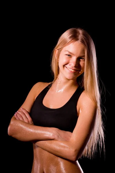 Fitness vrouw portret geïsoleerd op een witte achtergrond. Lachende hap — Stockfoto