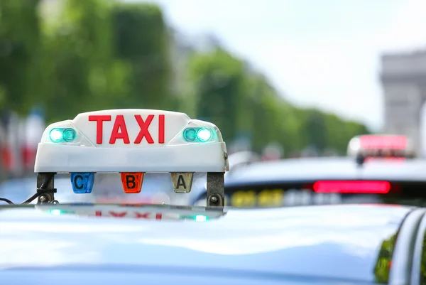 Parisian taxi in the city — Stock Photo, Image