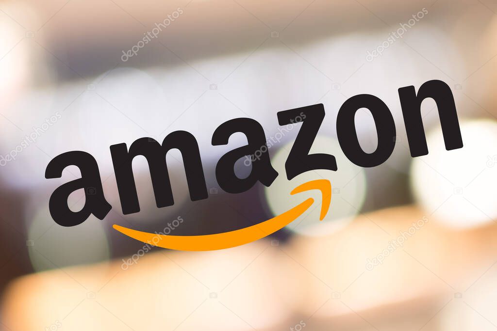 SEATTLE, WASHINGTON/USA - June 2, 2019:Selected Focus on the Amazon logo displayed on the window of an Amazon bookstore called Amazon Books
