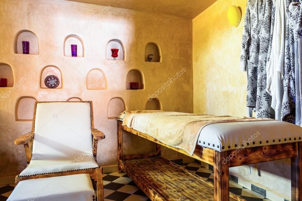 Comfortable massage room in blight yellow coloring